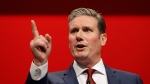 Opposition Labour Party leader Keir Starmer speaks on stage during the Labour Party Conference at the Brighton Centre in Brighton, England, Monday, Sept. 23, 2019. (AP Photo/Kirsty Wigglesworth)