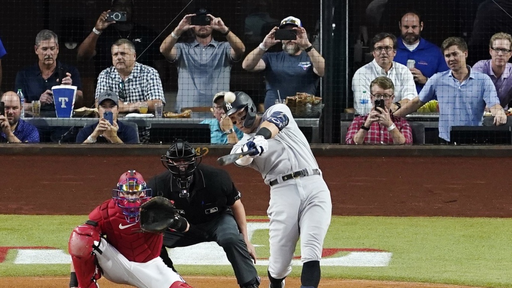 Yankees' Judge knocks open bullpen door while making running catch