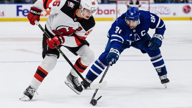 Devils top Flyers, set club mark with 11th straight road win