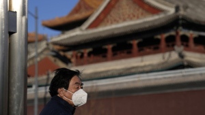 Masked person near Lama Temple in Beijing