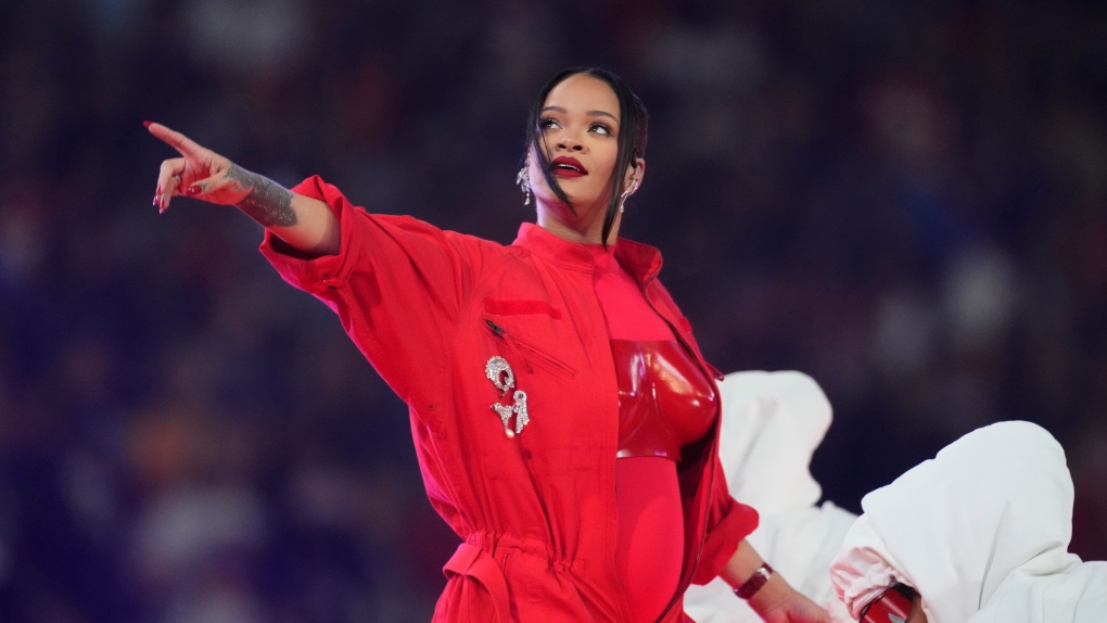 Rihanna Soars In Super Bowl Halftime Show; Reveals New Baby Bump – Review –  Deadline