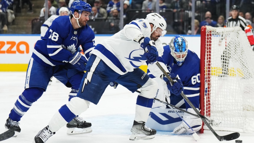 Lightning's Hedman falls awkwardly after taking hit from Svechnikov, forced  to exit game