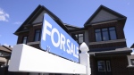 A new home is displayed for sale in a housing development in Ottawa on Tuesday, July 14, 2020. Statistics Canada says the first increase in annual inflation since its June 2022 peak was driven by higher mortgage interest costs.THE CANADIAN PRESS/Sean Kilpatrick