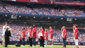 Nine new Canadian citizens sworn in before Toronto Blue Jays game