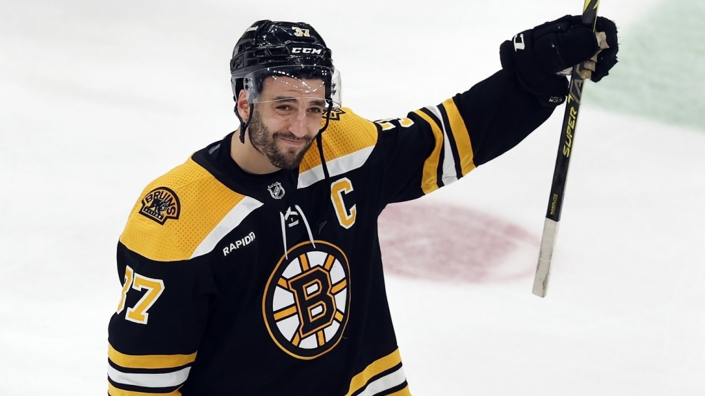 Bruins pull away in 3rd period, thump Red Wings