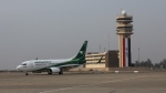 An Iraqi Airways plane arrives at Baghdad airport, Iraq, on Jan. 27, 2015. (AP Photo/Karim Kadim)