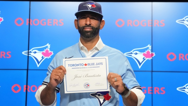 American League's Jose Bautista of the Toronto Blue Jays watches
