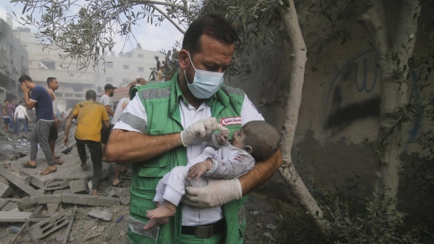 baby pulled out of buildings destroyed in Gaza