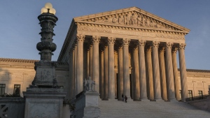 FILE - The Supreme Court is seen at sundown in Washington, on Nov. 6, 2020. (AP Photo/J. Scott Applewhite, File)