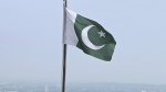 A Pakistani flag flies on a lookout in Islamabad, Pakistan, on July 27, 2022. (AP Photo/Rahmat Gul, File)