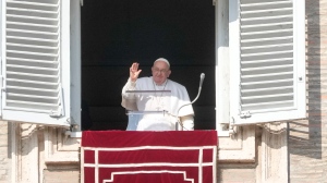 Pope Francis delivers the Angelus noon prayer in St. Peter's Square, at the Vatican, Sunday, Jan. 28, 2024. (AP Photo/Gregorio Borgia)