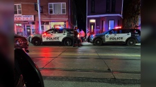 man pinned by car east Toronto