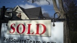A real estate sold sign is shown in a Toronto west end neighbourhood May 16, 2020. THE CANADIAN PRESS/Graeme Roy
