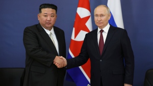 Russian President Vladimir Putin, right, and North Korean leader Kim Jong Un shake hands during their meeting at the Vostochny cosmodrome outside the city of Tsiolkovsky, about 200 kilometers (125 miles) from the city of Blagoveshchensk in the far eastern Amur region, Russia on Sept. 13, 2023. (Vladimir Smirnov/Sputnik Kremlin Pool Photo via AP, File)