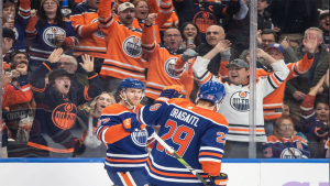 Edmonton Oilers' Connor McDavid (97) and Leon Draisaitl (29) celebrate a goal against the Vegas Golden Knights during second period NHL action in Edmonton on Tuesday November 28, 2023.THE CANADIAN PRESS/Jason Franson