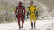 This image released by 20th Century Studios/Marvel Studios shows Ryan Reynolds as Deadpool/Wade Wilson and Hugh Jackman as Wolverine/Logan in a scene from 