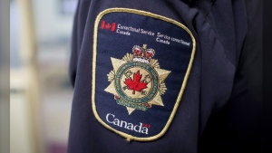 Correctional Service Canada says an unnamed inmate has been injured in what it's calling a major assault at the Port-Cartier Institution located on Quebec's north shore. Patches are seen on the arm and shoulder of a corrections officer in the segregation unit at the Fraser Valley Institution for Women during a media tour, in Abbotsford, B.C., on Thursday, Oct. 26, 2017. THE CANADIAN PRESS/Darryl Dyck