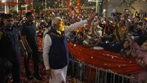 Narendra Modi is greeted by supporters as he arrives at Bharatiya Janata Party (BJP) headquarters in New Delhi, India, Tuesday, June 4, 2024. THE CANADIAN PRESS/AP-Manish Swarup