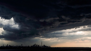 FILE - Storm clouds form over the skyline in Toronto, Monday June 6, 2016. THE CANADIAN PRESS/Mark Blinch