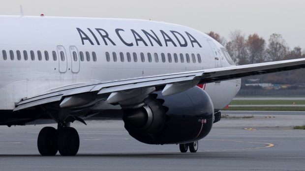 An Air Canada jet taxis at the airport, Wednesday, November 15, 2023 in Vancouver. THE CANADIAN PRESS/Adrian Wyld 