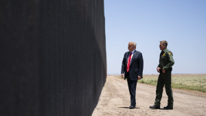 United States Border Patrol chief Rodney Scott gives President Donald Trump a tour of a section of the border wall, Tuesday, June 23, 2020, in San Luis, Ariz.  (AP Photo/Evan Vucci)