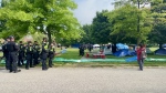Police are seen attending an encampment at York University on Thursday morning. (Submitted/Steve Ewasko)