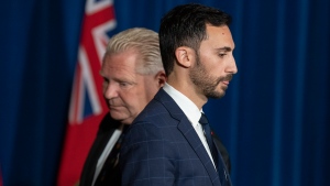 FILE - Ontario Premier Doug Ford (left) and Education Minister Stephen Lecce attend a news conference at the legislature in Toronto on Tuesday, November 8, 2022. THE CANADIAN PRESS/Chris Young 