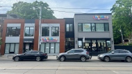 Cars are seen parked in a no-stopping rush hour zone in front of Lullaboo daycare in Toronto's Beaches neighbourhood. (Photo submitted by Liz Lapensee)
