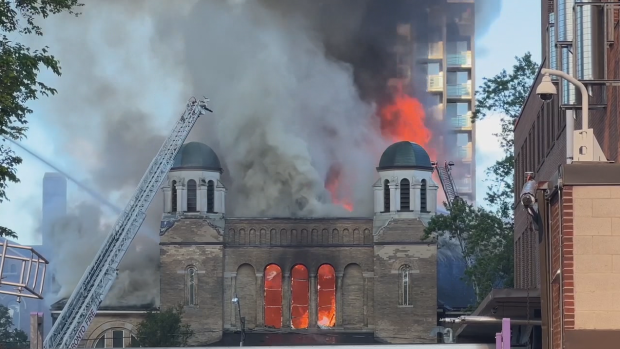 Crews are battling a fire at St. Anne's church in downtown Toronto that started Sunday, June 9, 2024. (CP24)