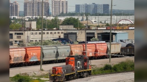 Quebec travellers who were hoping to hit New York City by train this summer will now have to wait until fall. CN rail trains are shown at the CN MacMillan Yard in Vaughan, Ont., on Monday, June 20, 2022. THE CANADIAN PRESS/Nathan Denette