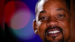 Actor Will Smith smiles during a photo shoot to promote his latest film, "Bad Boys: Ride or Die", in Mexico City, Friday, May 31, 2024. (AP Photo/Matias Delacroix)
