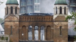  Firefighters work to put out a blaze at St. Anne's Anglican Church in Toronto's west end on Sunday, June 9, 2024. (Cole Burston/The Canadian Press) 