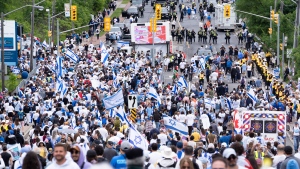 People gather for United Jewish Appeal’s annual Walk With Israel event in Toronto, on Sunday, June 9, 2024. THE CANADIAN PRESS/Arlyn McAdorey 