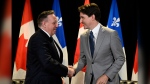 Prime Minister Justin Trudeau, right, and Quebec Premier François Legault shake hands as they meet, in Quebec City, Monday, June 10, 2024. THE CANADIAN PRESS/Jacques Boissinot