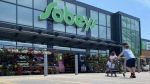 FILE - Shoppers at a west-end Toronto Sobeys grocery store, Sunday, June 26, 2023. THE CANADIAN PRESS/Graeme Roy