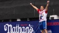 Joey Chestnut enters the 2023 Nathan's Famous Fourth of July hot dog eating contest in the Coney Island section of the Brooklyn borough of New York, Tuesday, July. 4, 2023. (AP Photo/Yuki Iwamura) 