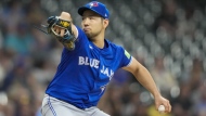 Toronto Blue Jays pitcher Yusei Kikuchi throws during the first inning of a baseball game against the Milwaukee Brewers Tuesday, June 11, 2024, in Milwaukee. (AP Photo/Morry Gash)