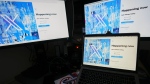 Computer monitors and a laptop display the X, formerly known as Twitter, sign-in page, July 24, 2023, in Belgrade, Serbia. (Darko Vojinovic/AP Photo)