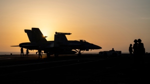 A fighter jet parks on the deck of the USS aircraft carrier Dwight D. Eisenhower near the Red Sea on Tuesday, June 11, 2024. (Bernat Armangue / AP Photo)
