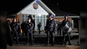 Security officers stand guard outside Orthodox Assyrian church in Sydney, Australia on April 15, 2024. (Mark Baker / AP Photo)