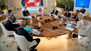 Clockwise from left, European Council President Charles Michel, German Chancellor Olaf Scholz, Canada's Prime Minister Justin Trudeau, French President Emmanuel Macron, Italian Prime Minister Giorgia Meloni, U.S. President Joe Biden, Japan's Prime Minister Fumio Kishida, Britain's Prime Minister Rishi Sunak and European Commission President Ursula von der Leyen participate in a working session during a G7 summit at Borgo Egnazia, Italy, Thursday, June 13, 2024. (Andrew Medichini/AP Photo) 