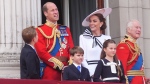 From left, Britain's Prince George, Prince William, Prince Louis, Kate, Princess of Wales, Princess Charlotte and King Charles III on the balcony of Buckingham Palace to view the flypast following the Trooping the Color ceremony in London, Saturday, June 15, 2024. Trooping the Color is the King's Birthday Parade and one of the nation's most impressive and iconic annual events attended by almost every member of the Royal Family. (James Manning/PA via AP) 