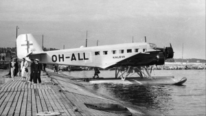 The Junkers Ju 52 aircraft "Kaleva" by the Finnish airline Aero is parked at the Katajanokka seaplane harbor in Helsinki equipped with floating bottom skis. Photo dated July 14, 1936. (Finnish Aviation Museum via AP)