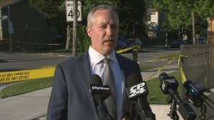 Det. Sgt. Aaron Akeson, of Toronto Police Service’s (TPS) Homicide and Missing Persons Unit, speaks to the media on June 15 outside the scene of a homicide in Scarborough.