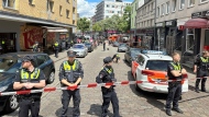 Police cordon off an area near the Reeperbahn in Hamburg, Germany, Sunday, June 16, 2024. (Steven Hutchings/via AP)