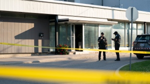 Toronto police officers investigate reports of gunshots, in Toronto, Monday, June 17, 2024. THE CANADIAN PRESS/Arlyn McAdorey