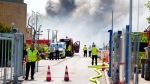 Police and firefighters secure the area around a fire at the Novo Nordisk headquarters in Bagsvaerd, Denmark on May 22, 2024. (Liselotte Sabroe / Ritzau Scanpix via AP)
