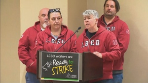 Members of a union representing approximately 10,000 LCBO workers are shown during a press conference on June 18.
