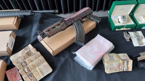 Cash, drugs and other items seized as part of 'Project Lookout' are displayed at a news conference Wednesday June 19, 2024. (Patrick Darrah)