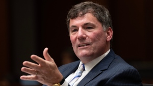 Minister of Public Safety, Democratic Institutions and Intergovernmental Affairs Dominic LeBlanc speaks with colleagues as he waits to appear at the Procedure and House Affairs committee, Thursday, June 20, 2024 in Ottawa. (Adrian Wyld / The Canadian Press)